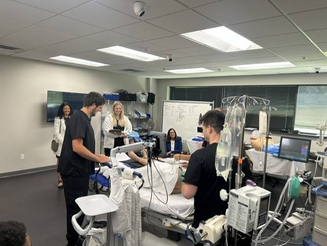 Ohio representatives observe students in ODU’s Anesthesiologist Assistant Program simulation lab.