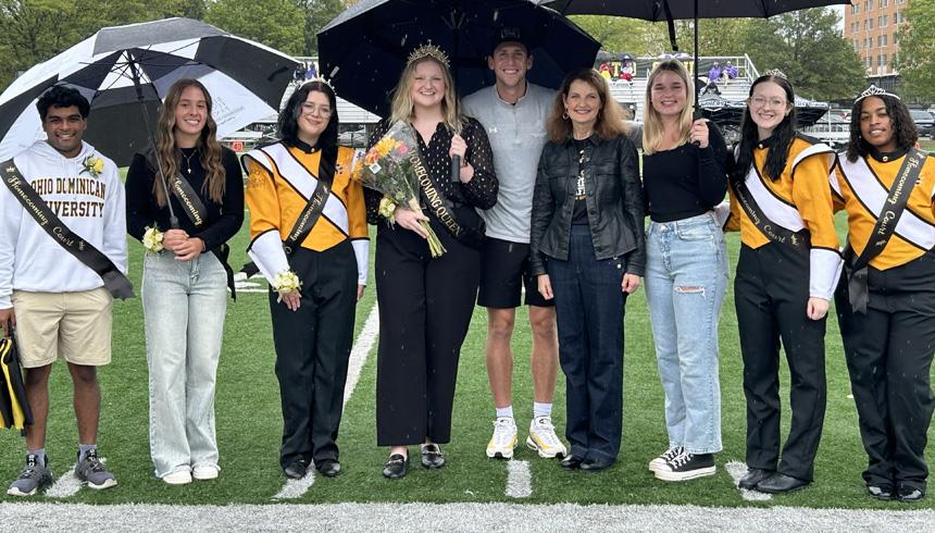Students who won their respective homecoming title stand together.